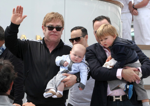 Elton John & Family Arrive In Venice